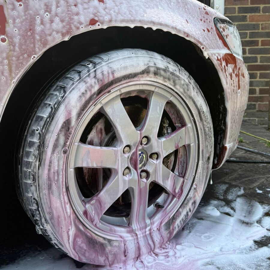 Alloy wheel during deep clean — fallout remover lifting brake dust